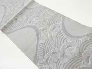 綴れ曲線に波車模様織出し名古屋帯